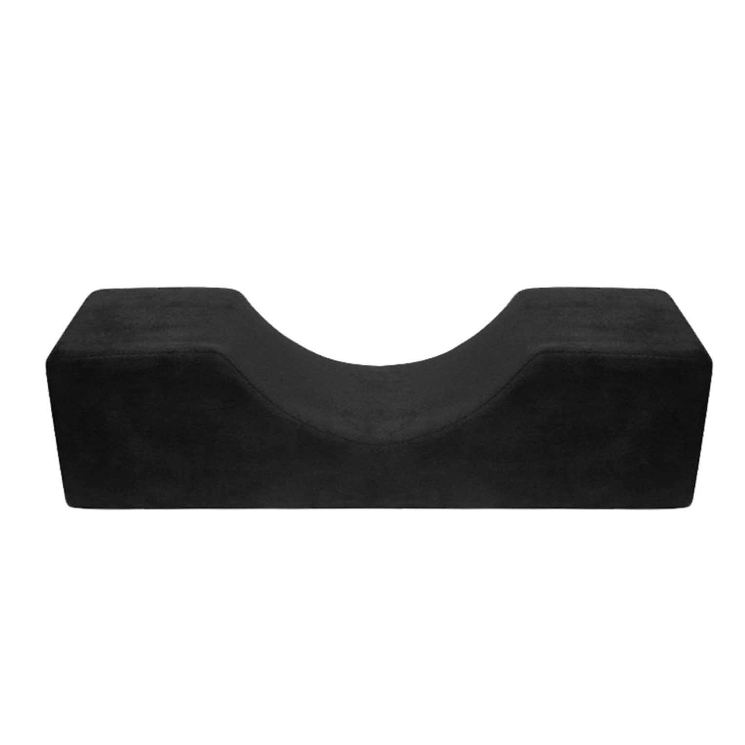 Almofada para Extensão de Pestanas Almofada ortopédica preta em formato curvo sobre fundo branco