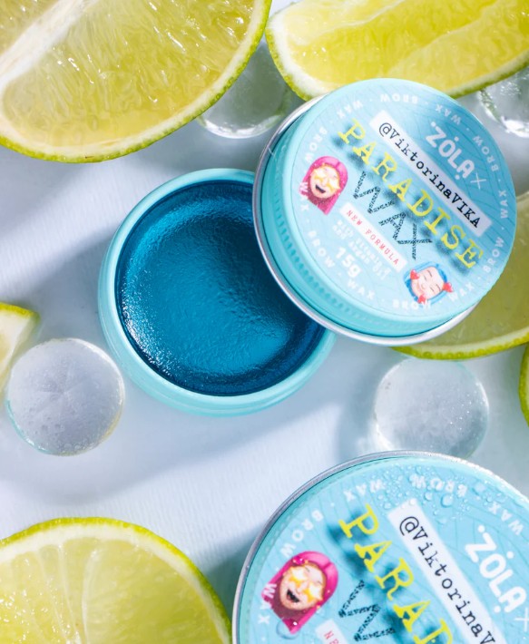 ZOLA Paradise Wax 30 g - Styling e Fixação de Sobrancelhas Frasco de cera para cabelo azul com rótulo e limões ao redor
