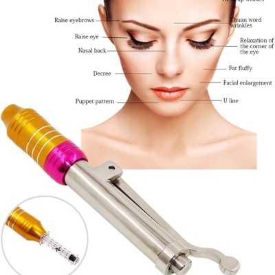 Dispositivo metálico colorido e esquema facial com zonas para tratamento