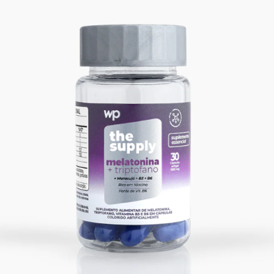 Frasco de suplemento alimentar melatonina e triptofano com cápsulas azuis.