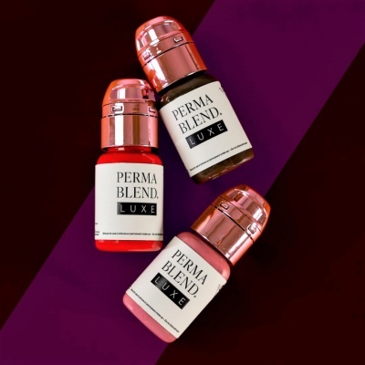 Três frascos de cosméticos PERMA BLEND LUXE com tampas cor de rosa dourado