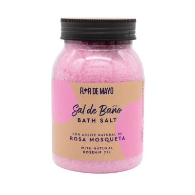 Frasco plástico rosa com sal de banho e rótulo bilingue