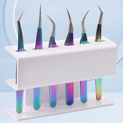 Conjunto de seis pinças coloridas com suporte branco