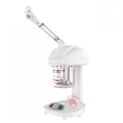 Máquina branca com jarro de vidro e botões coloridos