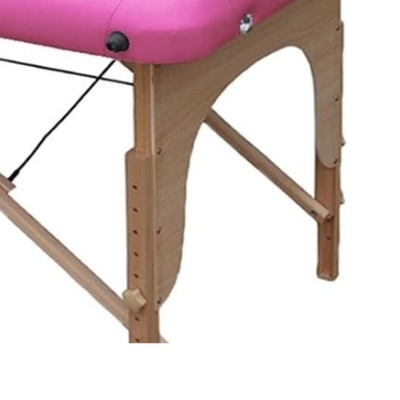 Mesa de massagem de madeira com tampo rosa