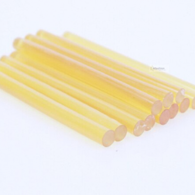 Dez hastes cilíndricas amarelas translúcidas