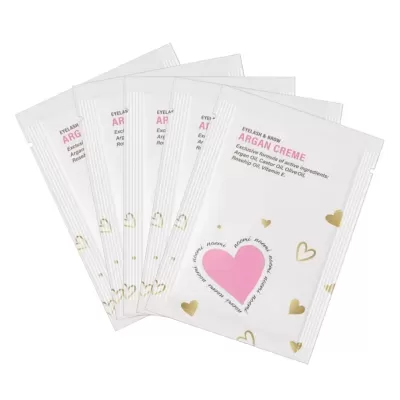 Conjunto de saquetas de creme para pestanas e sobrancelhas Argan Creme com coração rosa e detalhes dourados