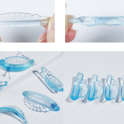 Asas decorativas azuis translúcidas com textura detalhada e texto 'XL'