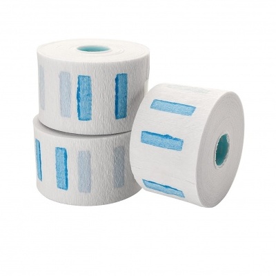 Três rolos de papel higiénico com padrões azuis e cinza