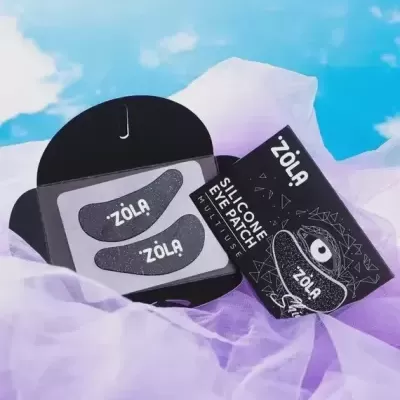 Patchs de olhos em silicone da ZÖLA com embalagem preta e tecido lilás