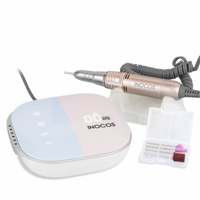 Equipamento para unhas INOCOS com unidade principal, caneta manual e acessórios em caixa transparente.