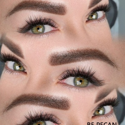 Close-up de olhos maquilhados com pestanas longas e sobrancelhas castanho escuro