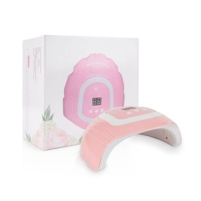 Dispositivo rosa e branco para secagem de verniz com embalagem