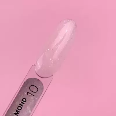 Amostra de verniz gel com brilhos sobre fundo rosa.