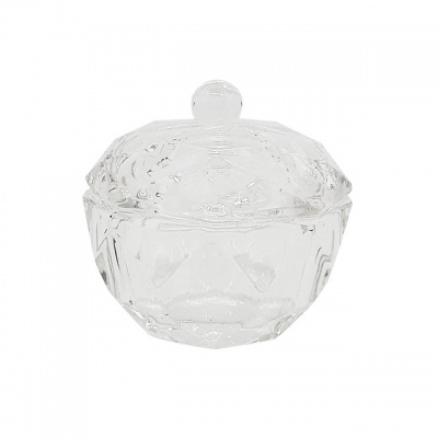 Pote de vidro transparente com tampa facetada e pega arredondada