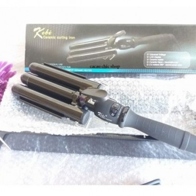 Modelador de cabelo preto com três cilindros e caixa