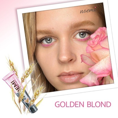 Mulher loira com maquilhagem rosa e rosa ao lado, tubo de creme rosa, texto noemi e GOLDEN BLOND