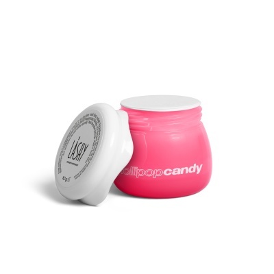 Frasco plástico rosa com tampa branca desenroscada e texto 'Lollipop candy'
