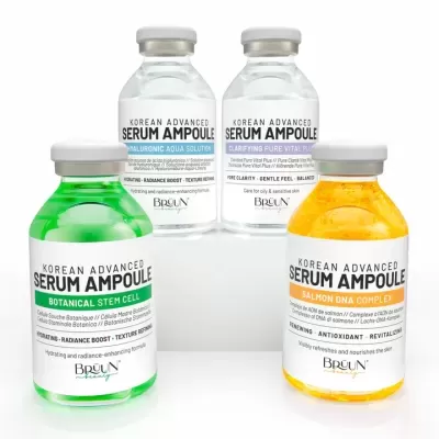 Quatro frascos coloridos de séruns Korean Advanced Serum Ampoule com rótulos distintos e tampas metálicas.