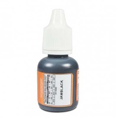 Frasco pequeno de tinta preta com tampa branca e rótulo JAMBLACK.