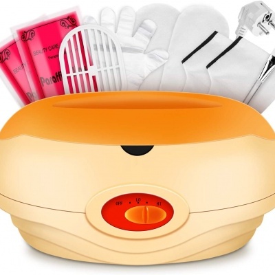 Aparelho aquecedor de parafina bege e laranja com acessórios brancos e embalagem rosa