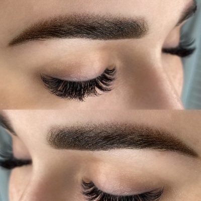 Close-up de olhos fechados com pestanas postíças e sobrancelhas definidas