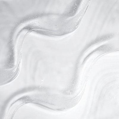 Superfície translúcida ondulada com textura lisa e bolhas pequenas