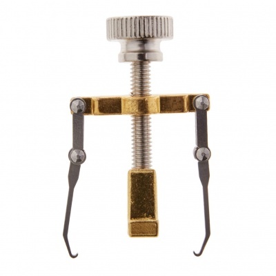 Instrumento metálico com parafuso e braços articulados