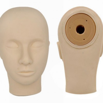 Duas cabeças de manequim bege, frente e trás com base circular