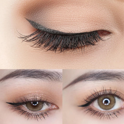 Olhos femininos maquiados com sombra castanha, delineador preto e pestanas longas.
