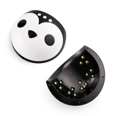 Aparelho para unhas formato pinguim branco e preto com LEDs