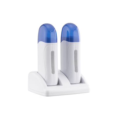 Depiladores elétricos brancos com tampa azul em suporte branco