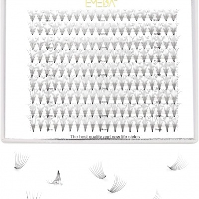 Caixa branca com pestanas falsas organizadas em tufos pretos de várias medidas