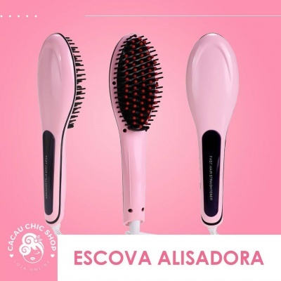 Escova alisadora de cabelo cor-de-rosa com cerdas pretas e pontas vermelhas