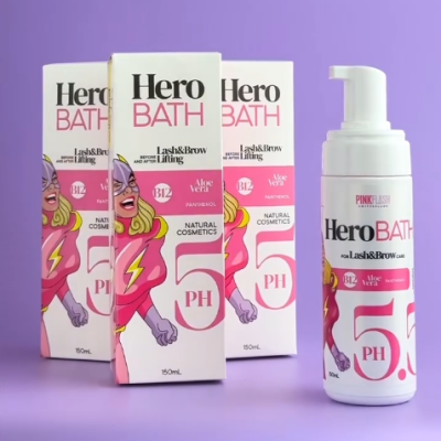 Frascos e embalagens do produto Hero BATH para Lash&Brow com design colorido e texto informativo.