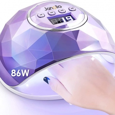 Secador de unhas elétrico Janolia roxo com visor digital e mão dentro