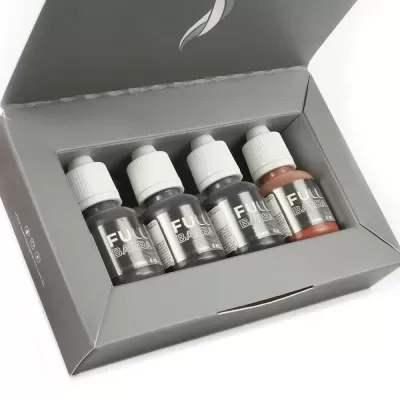 Conjunto de tintas para barba em frascos numa caixa cinzenta