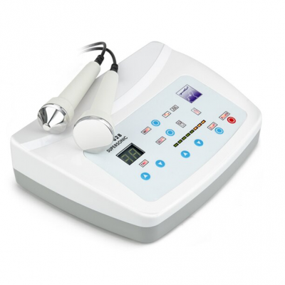 aparelho branco com ecrã digital e dois aplicadores metálicos ligados