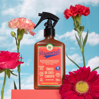 Frasco de tónico capilar Rapunzel rodeado de flores coloridas