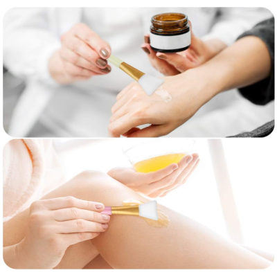 Aplicação de creme com espátula em mão e perna, frasco castanho com rótulo branco aberto