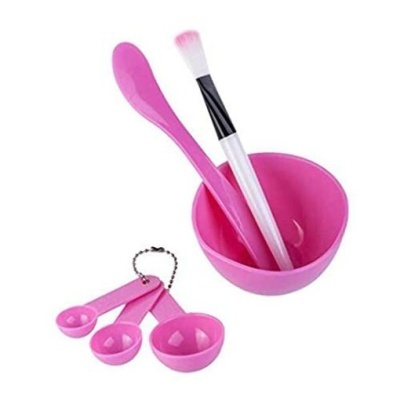 Conjunto rosa de utensílios para cosméticos com tigela, pincel, espátula e medidores
