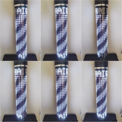 Tubo transparente com luzes LED formando a palavra 'AIR'