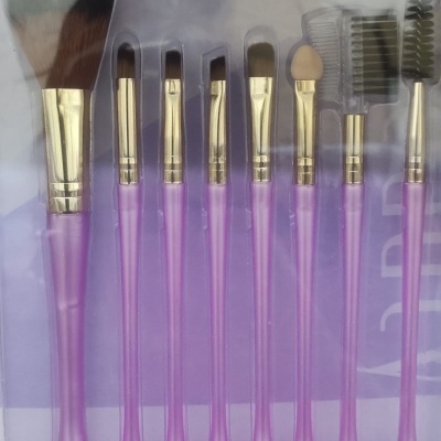 Conjunto de pincéis para maquilhagem com cabo roxo e cerdas variadas em embalagem de blister