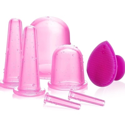 Conjunto de ventosas de silicone rosa e escova facial roxa para cuidados de pele