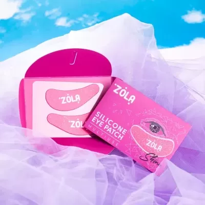 Caixa rosa de silicone para patches de olhos da marca ZÖLA com dois patches cor de rosa