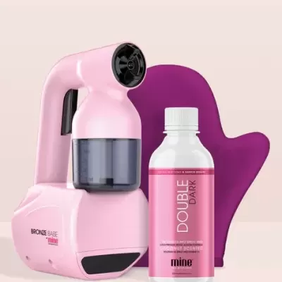 Dispositivo de bronzeamento portátil rosa com frasco de spray Double Dark e luva roxa