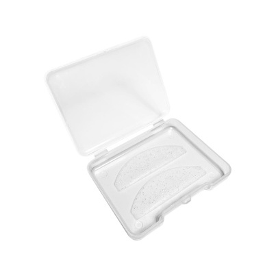 Estojo transparente com duas almofadas para olhos com partículas pretas