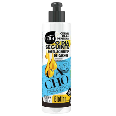 Frasco de creme para pentear com tampa de bomba preta e rótulo colorido com texto