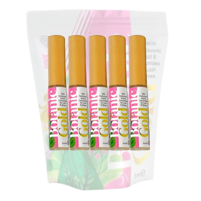 Cinco tubos de rímel Botanic Gold em fila sobre embalagem translúcida