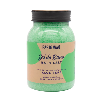 Frasco de sais de banho verdes com etiqueta bege e verde e tampa preta